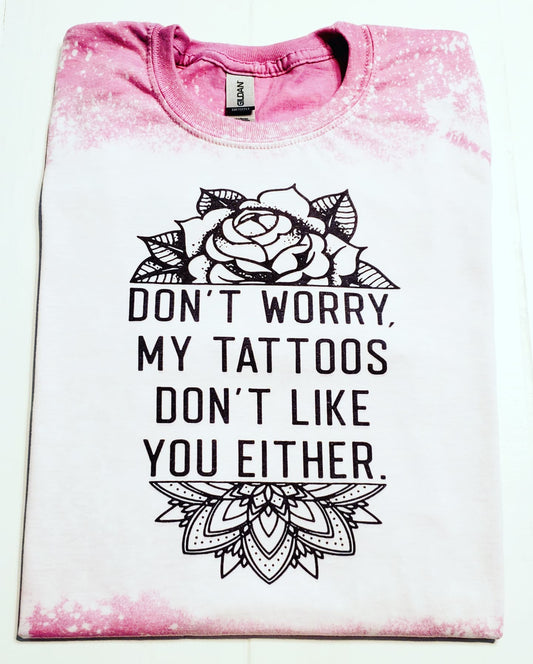 "Don't worry.  My tattoos don't like you either." T Shirt